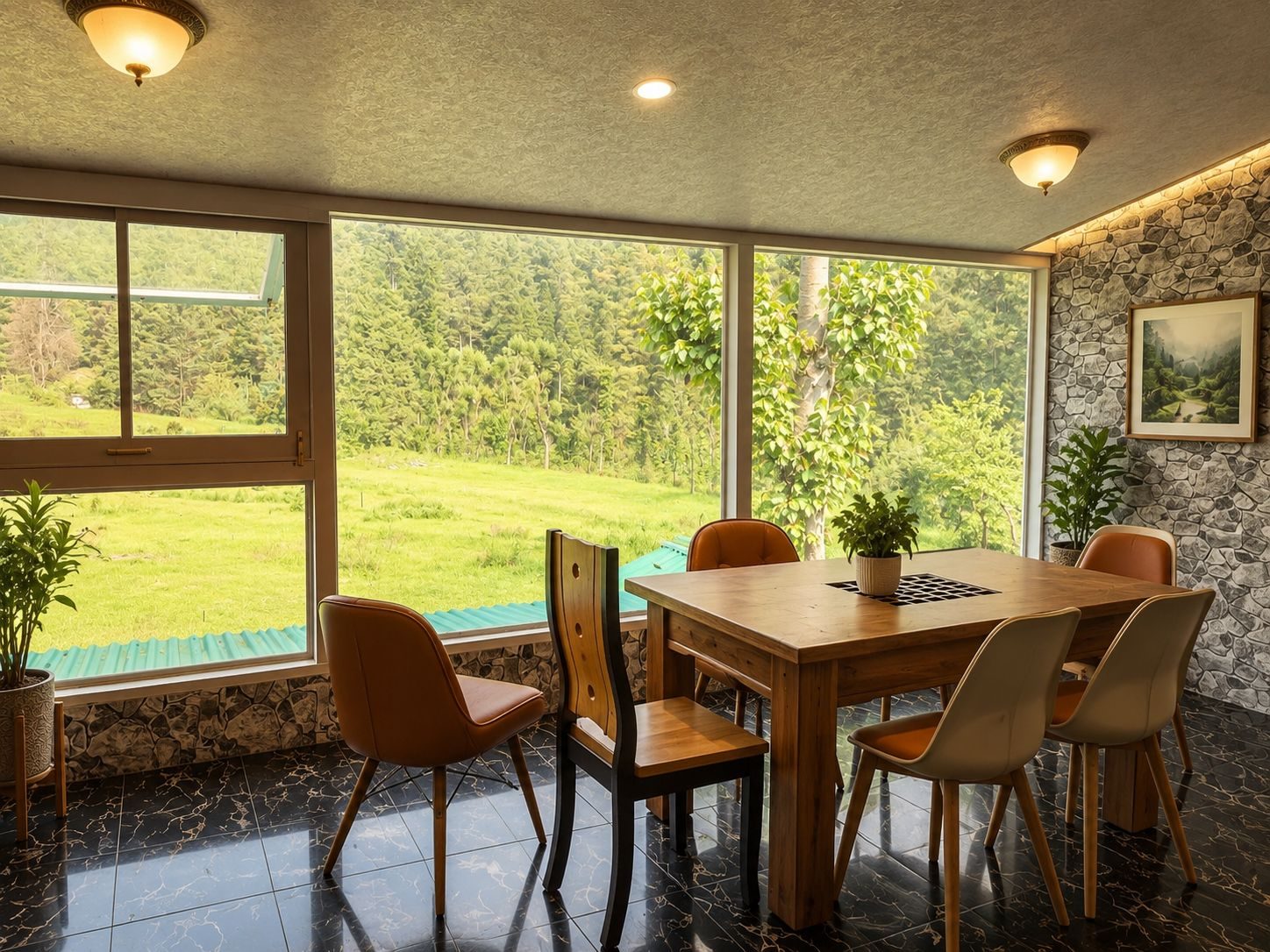 Dining area with panoramic forest and meadow view at KashÔtel